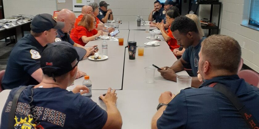 CFA Alumni donating children’s helmets and stickers to Station 12 & Dinner at  Station 12